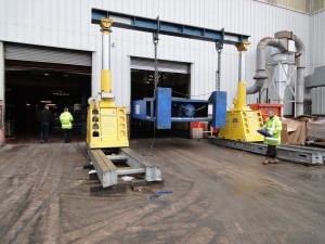 Transporting a 1,200 ton Hydraulic Press to the Second Floor with a Hydraulic Gantry